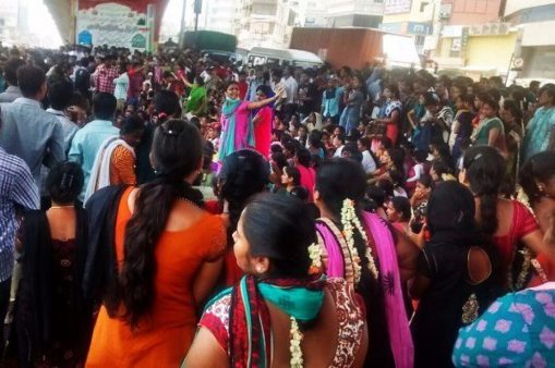 Slogging to keep home fires burning, women garment workers in a double bind